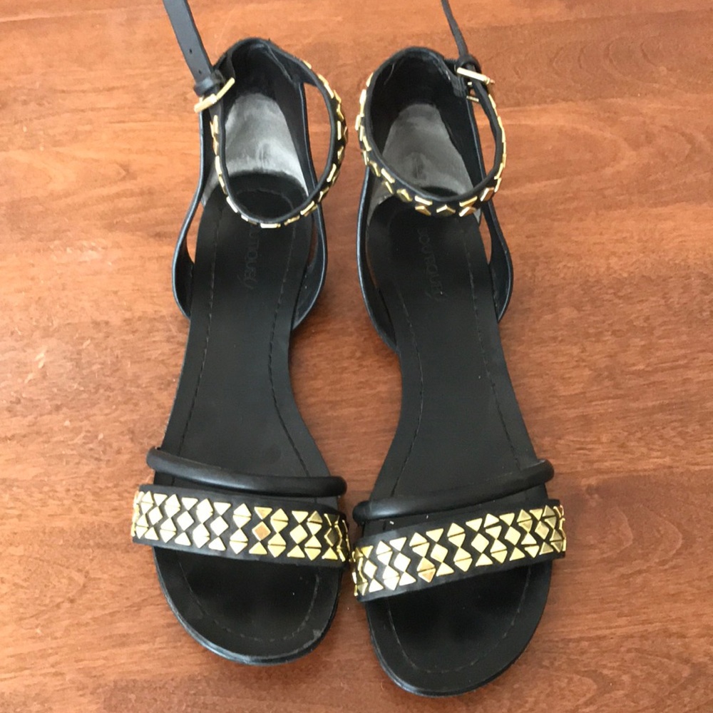 Black and gold strappy sandals